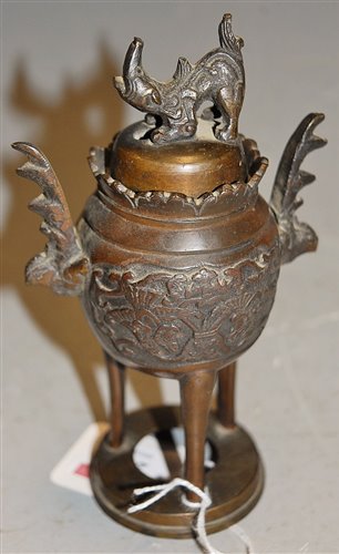 Lot 276 - A Chinese bronze korro and cover, height 16cm