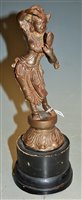 Lot 277 - A bronze metal figure of an Indian deity on...