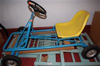Lot 496 - A dolls cot and a childs metal framed go-cart etc