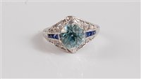 Lot 1160 - A platinum, zircon, sapphire and diamond ring,...
