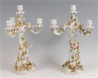 Lot 1080 - A pair of circa 1900 German porcelain four...