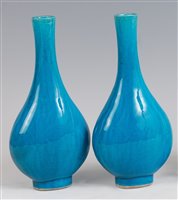 Lot 1305 - A pair of Chinese bottle vases, each of ovoid...