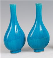 Lot 1305 - A pair of Chinese bottle vases, each of ovoid...