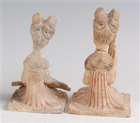 Lot 1306 - A pair of Chinese terracotta burial figures,...