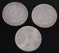 Lot 2023 - USA, 1900 silver Morgan dollar, together with...