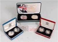 Lot 2058 - Great Britain, three cased silver proof coin...