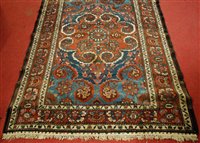 Lot 1550 - A Persian bakhtiari woollen rug, the blue...