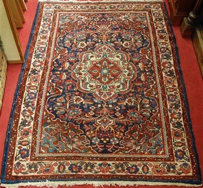 Lot 1364 - A Persian woollen Tafresh rug, having a floral...