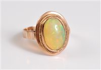 Lot 2628 - An opal ring, the oval cabochon approx. 12.8 x...