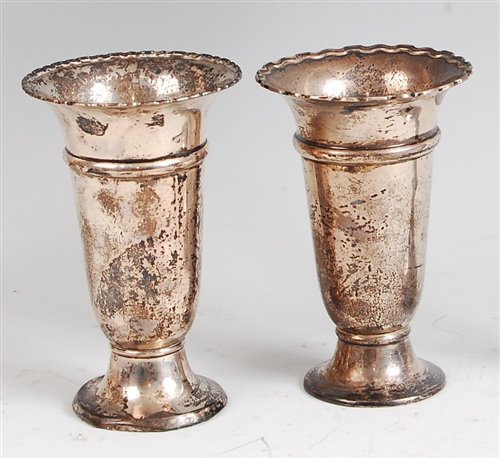 Lot 128 - A near-pair of late Art Nouveau silver footed...