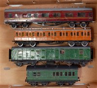 Lot 453 - Large tray containing four bogie coaches,...