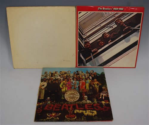 Lot 563 - Three vinyl LP records by The Beatles,...