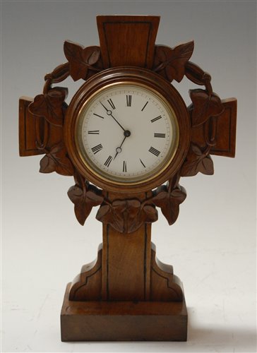 Lot 41 - A late Victorian oak cased mantel clock, the...