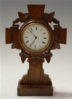 Lot 41 - A late Victorian oak cased mantel clock, the...