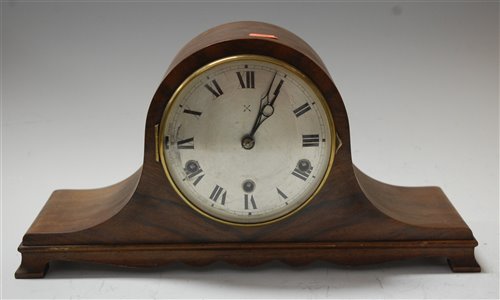 Lot 48 - A 1940s walnut cased mantel clock, the...
