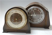 Lot 62 - A 1950s oak cased mantel clock, having...