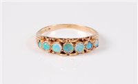 Lot 2654 - A 9ct seven stone opal ring, the seven...