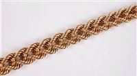 Lot 1195 - A 9ct rope twist bracelet, the the two double...