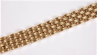 Lot 1196 - A 9ct bracelet, the 18mm wide brick link...