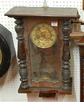 Lot 94 - An early 20th century oak cased wall clock...