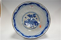 Lot 145 - A Japanese stoneware blue and white bowl...