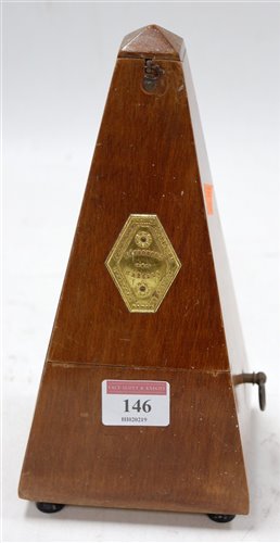 Lot 146 - A mid 20th century French walnut metronome,...
