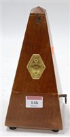 Lot 146 - A mid 20th century French walnut metronome,...
