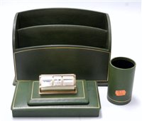 Lot 148 - A modern green leather clad stationery set to...