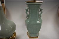 Lot 168 - A reproduction celadon glazed and gilt...