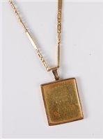 Lot 2680 - A postage stamp pendant and 18ct chain, the...
