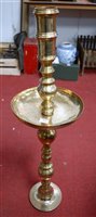Lot 201 - A large Eastern brass candlestick, h.91cm