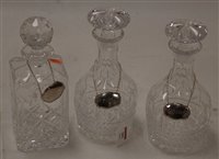 Lot 203 - A pair of cut glass decanters, each with...