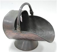Lot 247 - A 19th century copper helmet shaped coal scuttle