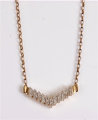 Lot 443 - A 14k diamond pendant and chain, the pave set '...