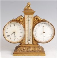 Lot 1514 - A circa 1900 gilt metal combination clock...