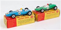 Lot 1904 - A Dinky Toys boxed F1 racing diecast group to...