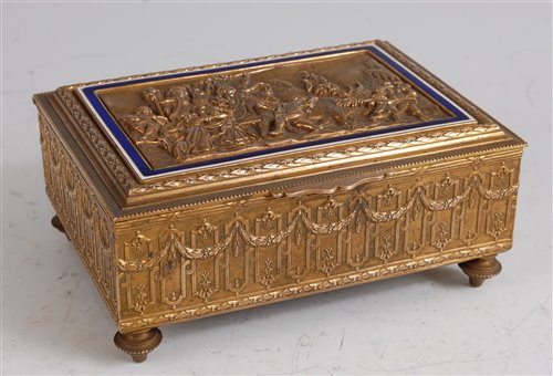 Lot 1259 - A late 19th century brass music box, the...