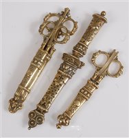 Lot 1288 - Two pairs of Victorian brass desk scissors,...