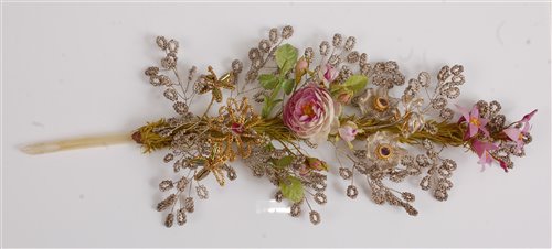 Lot 1269 - A gold and silver thread floral filigree quill...