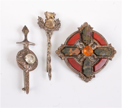 Lot 2629 - Two Scottish silver brooches and an agate...