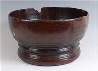 Lot 1293 - A turned elm bowl, of good size, raised on...