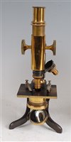 Lot 1242 - A late 19th century lacquered brass monocular...