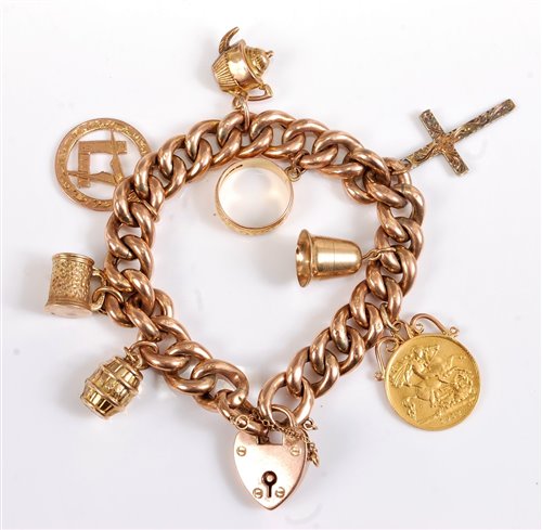 Lot 2606 - A 9ct curblink charm bracelet, set with...
