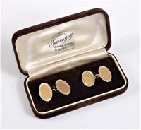 Lot 2630 - A pair of 18ct and platinum cufflinks, the...