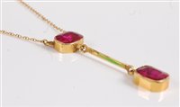 Lot 2619 - A 9ct red stone pendant necklace, the two oval...