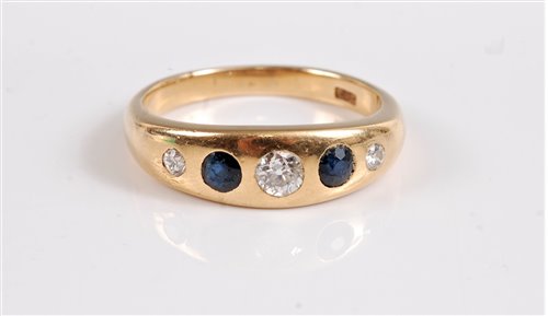 Lot 2517 - A gentleman's 18ct sapphire and diamond ring,...