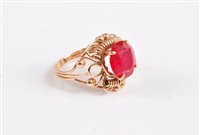 Lot 2622 - A synthetic ruby ring, the off round synthetic...