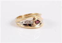 Lot 358 - An 18ct ruby and white hardstone ring, the...