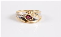 Lot 2624 - An 18ct ruby and white hardstone ring, the...