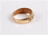 Lot 2516 - A seven stone gemset ring, the seven small...